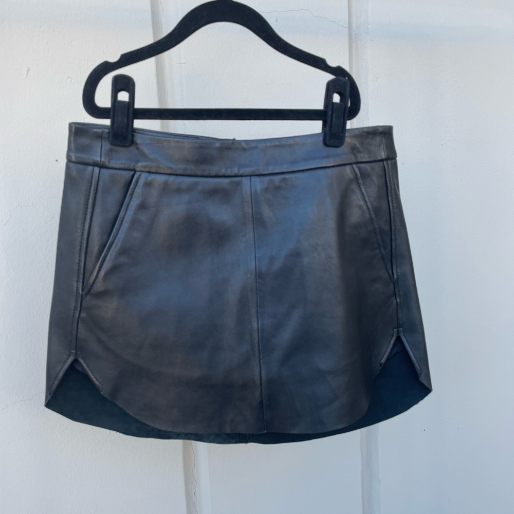 Michelle Mason black leather skirt with pockets in size 0